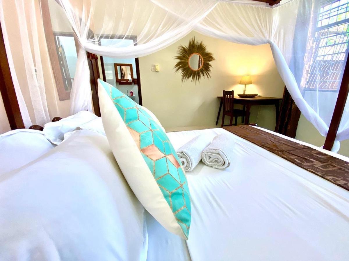 Villa Orchid Beach Guest House Bwejuu Exterior photo
